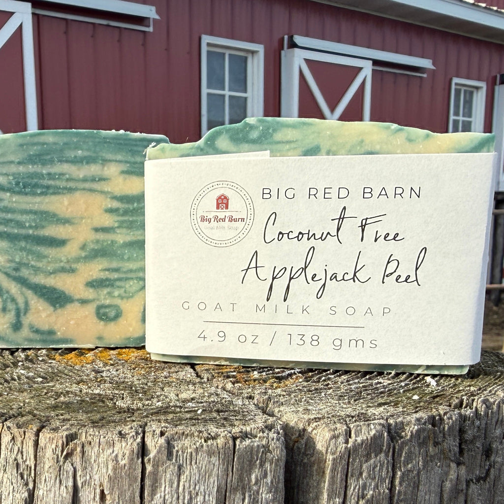 Bar of soap with a label in front of a red barn