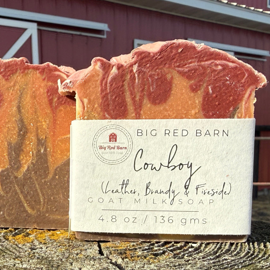 Bar of soap with a label in front of a red barn