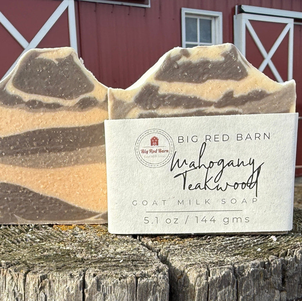 Bar of soap with a label in front of a red barn