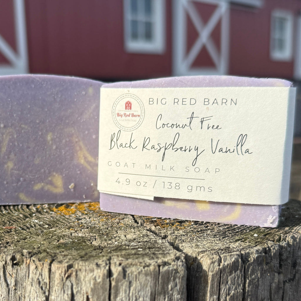 Bar of soap with a label in front of a red barn